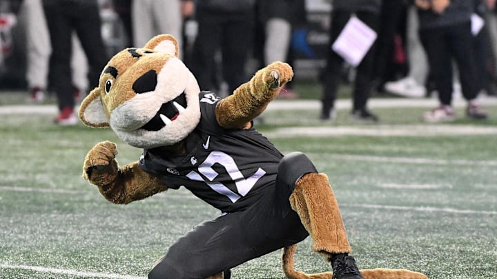 Nov 17, 2023; Pullman, Washington, USA; Washington State Cougars mascot, Butch, performs during a game against the Colorado Buffaloes in the second half at Gesa Field at Martin Stadium. Mandatory Credit: James Snook-Imagn Images