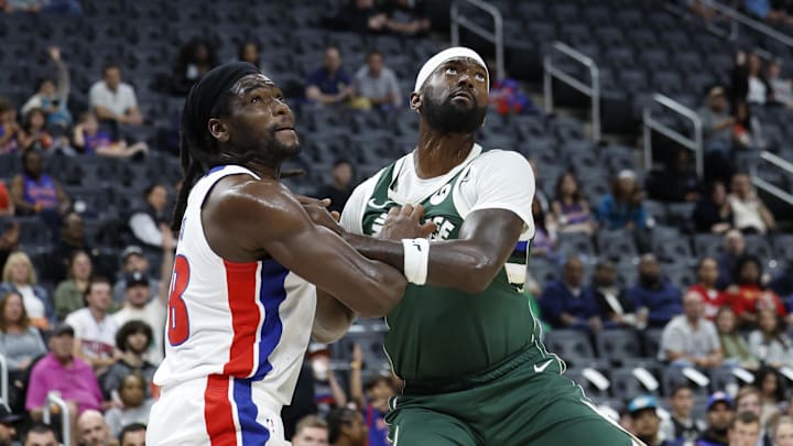 Oct 6, 2024; Detroit, Michigan, USA;  Detroit Pistons center Isaiah Stewart (28) and Milwaukee Bucks forward Bobby Portis (9) look for the rebound in the first half at Little Caesars Arena. Mandatory Credit: Rick Osentoski-Imagn Images