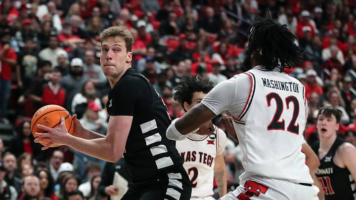 Feb 3, 2024; Lubbock, Texas, USA; Cincinnati Bearcats forward Victor Lakhin (30) works the ball against Texas Tech Red Raiders forward Warren Washington (22) in the first half at United Supermarkets Arena. Mandatory Credit: Michael C. Johnson-USA TODAY Sports Feb 3, 2024; Lubbock, Texas, USA; Cincinnati Bearcats forward Victor Lakhin (30) works the ball against Texas Tech Red Raiders forward Warren Washington (22) in the first half at United Supermarkets Arena. Mandatory Credit: Michael C. Johnson-USA TODAY Sports