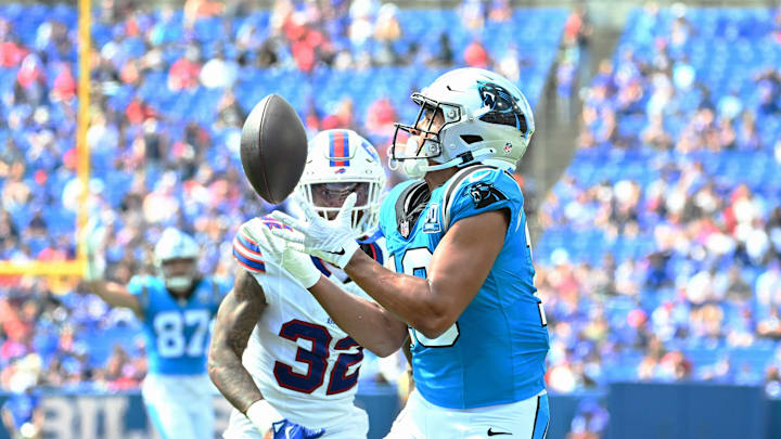 Aug 24, 2024; Orchard Park, New York, USA; Carolina Panthers wide receiver Jalen Coker (18) catches a pass for a touchdown over Buffalo Bills cornerback Kyron Brown (32) in the fourth quarter pre-season game at Highmark Stadium.
