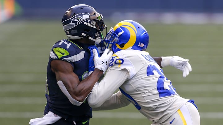 Dec 27, 2020; Seattle, Washington, USA; Los Angeles Rams cornerback Jalen Ramsey (20) covers Seattle Seahawks wide receiver DK Metcalf (14) during the second quarter at Lumen Field. Mandatory Credit: Joe Nicholson-Imagn Images Dec 27, 2020; Seattle, Washington, USA; Los Angeles Rams cornerback Jalen Ramsey (20) covers Seattle Seahawks wide receiver DK Metcalf (14) during the second quarter at Lumen Field. Mandatory Credit: Joe Nicholson-Imagn Images