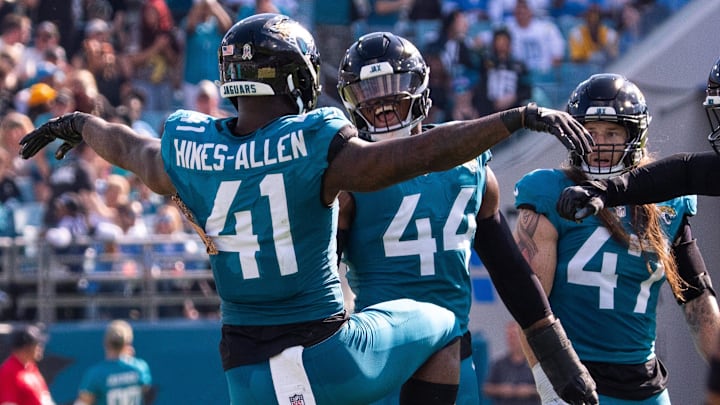 Jacksonville Jaguars defensive end Josh Hines-Allen (41) celebrates with teammates after sacking Los Angeles Chargers quarterback Justin Herbert (10) in the second quarter, breaking a franchise record for sacks in an NFL football game at EverBank Stadium, Sunday, November 16, 2025, in Jacksonville, Fla. [Doug Engle/Florida Times-Union]