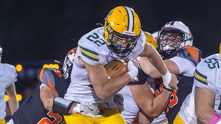 Howell's Bryce Kish (22) finds an opening in the line during a victory over Brighton Friday, Oct. 17, 2025. Howell's Bryce Kish (22) finds an opening in the line during a victory over Brighton Friday, Oct. 17, 2025.