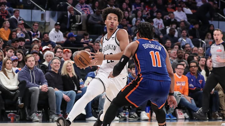Mar 23, 2024; New York, New York, USA;  Brooklyn Nets forward Jalen Wilson (22) looks to drive past New York Knicks guard Jalen Brunson (11) in the second quarter at Madison Square Garden. Mandatory Credit: Wendell Cruz-Imagn Images