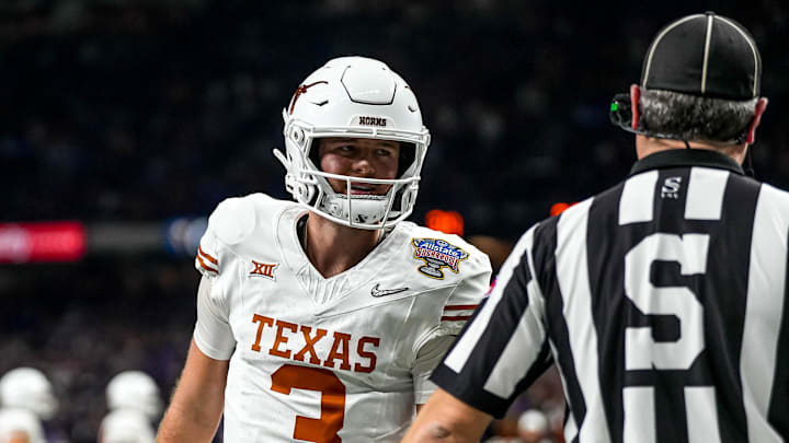 Texas Longhorns quarterback Quinn Ewers (3) talks to an official during the Sugar Bowl College