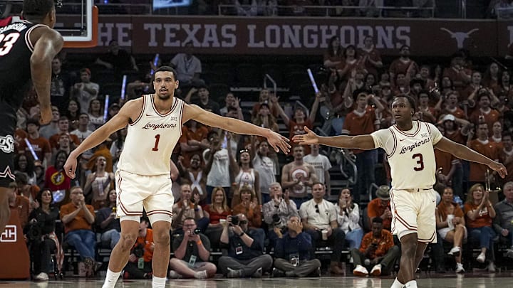 Mar 2, 2024; Austin, Texas, USA; Texas longhorns forward Dylan Disu (1) and guard Max Abmas (3)