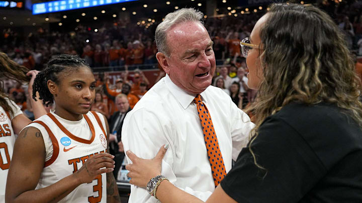 Texas Longhorns head coach Vic Schaefer meets William & Mary head coach Erin Dickerson Davis after the first-round NCAA playoff game against William & Mary at the Moody Center on Saturday, March 22, 2025.