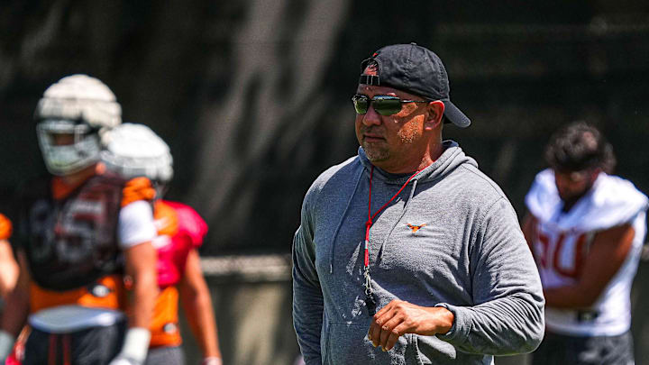 Johnny Nansen, co-defensive coordinator for the Texas Longhorns, watches defensive drills during practice at Frank Denius Fields on Thursday, Aug. 1, 2024 in Austin.