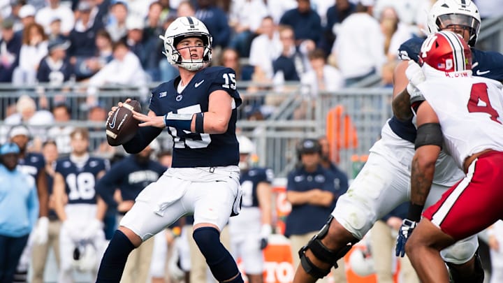Penn State quarterback Drew Allar prepares to throw a 16-yard touchdown pass to Theo Johnson in the