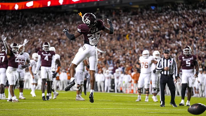 Texas A&M defensive back Will Lee III (26) reacts to a missed interception intended for Texas Longhorns receiver DeAndre Moore Jr. (0) during the Lone Star Showdown at Kyle Field on Saturday, Nov. 30, 2024 in College Station, Texas. Texas A&M defensive back Will Lee III (26) reacts to a missed interception intended for Texas Longhorns receiver DeAndre Moore Jr. (0) during the Lone Star Showdown at Kyle Field on Saturday, Nov. 30, 2024 in College Station, Texas.
