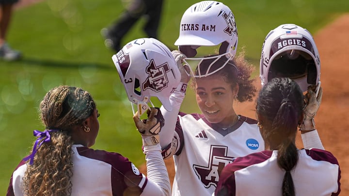 Texas A&M infielder Amari Harper (13) celebrates a home run as she runs home during the NCAA D1 Softball Tournament Regional against Saint Francis University at Davis Diamond at Texas A&M University on Friday, May 16, 2025 in College Station, Texas.