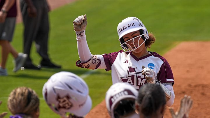 Texas A&M infielder Amari Harper (13) celebrates a home run as she runs home during the NCAA D1 Softball Tournament Regional against Saint Francis University at Davis Diamond at Texas A&M University on Friday, May 16, 2025 in College Station, Texas.