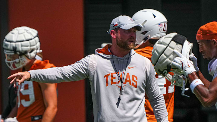 Blake Gideon, safeties coach for the Texas Longhorns, gives instructions at practice at Frank Denius Fields on Thursday, Aug. 1, 2024 in Austin.