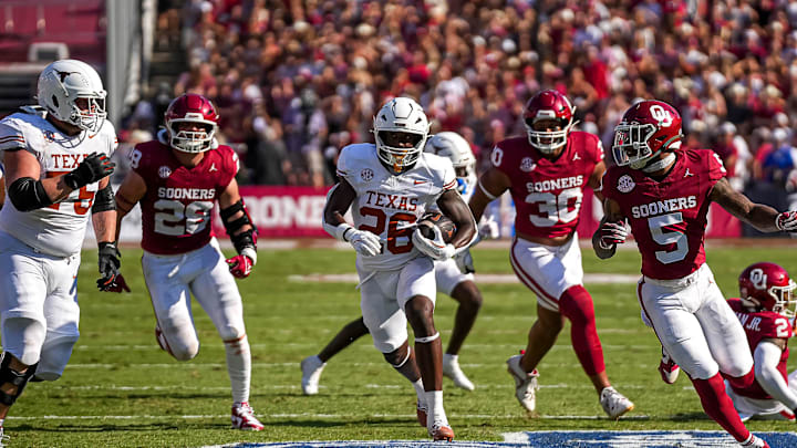 Texas Longhorns running back Quintrevion Wisner (26) runs the ball during the Red River Rivalry game against Oklahoma at the Cotton Bowl on Saturday, Oct. 12, 2024 in Dallas, Texas.