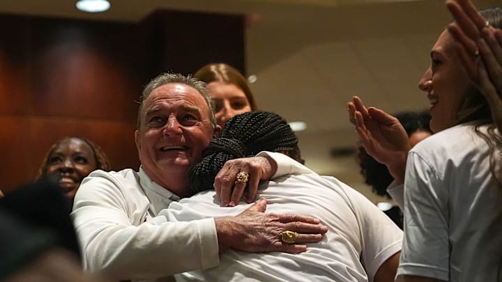 Texas Longhorns head coach Vic Schaefer hugs Madison Booker after being announced as the region four number one seed in the NCAA womens basketball tournament selection show at the University of Texas at Austin on Sunday, March 17, 2024.