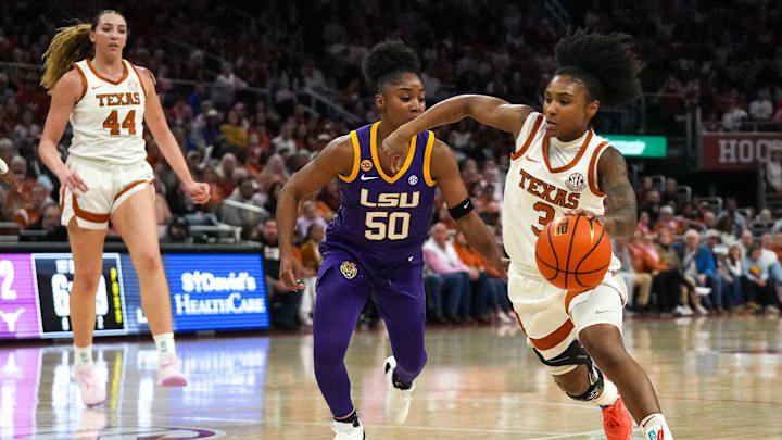 Texas Longhorns guard Rori Harmon (3) pushes past LSU guard Shayeann Day-Wilson (50) during the game at the Moody Center on Sunday, Feb. 16, 2025.