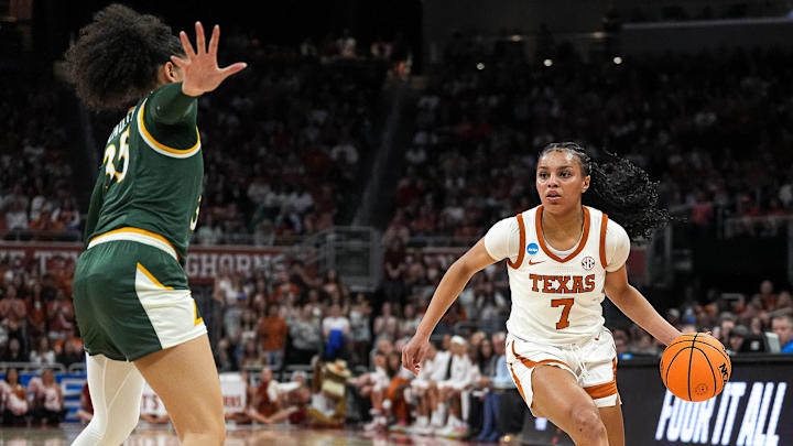 Texas Longhorns guard Jordan Lee (7) dribbles the ball towards the William Mary basket during the first round NCAA playoff game at the Moody Center on Saturday, March 22, 2025. Texas Longhorns guard Jordan Lee (7) dribbles the ball towards the William Mary basket during the first round NCAA playoff game at the Moody Center on Saturday, March 22, 2025.