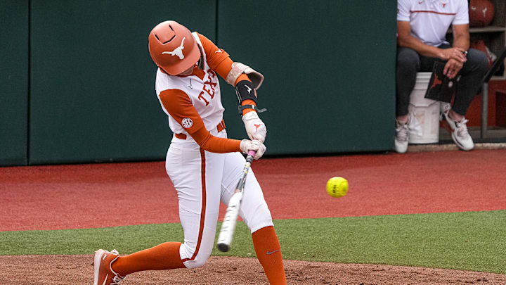 Texas Longhorns catcher Reese Atwood (14) swings at a pitch during the game against Kentucky at Red & Charline McCombs Field on Thursday, May 1, 2025 in Austin. Texas Longhorns catcher Reese Atwood (14) swings at a pitch during the game against Kentucky at Red & Charline McCombs Field on Thursday, May 1, 2025 in Austin.