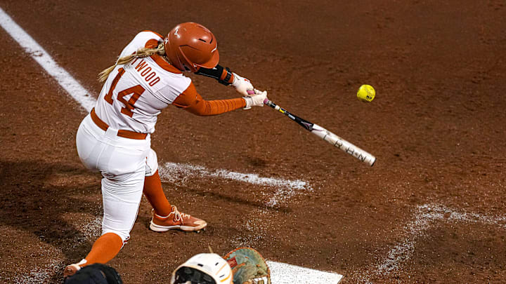 Texas Longhorns catcher Reese Atwood (14) swings at a ptich during the game against Tennessee at Red & Charline McCombs Field on Friday, April 11, 2025 in Austin. Texas Longhorns catcher Reese Atwood (14) swings at a ptich during the game against Tennessee at Red & Charline McCombs Field on Friday, April 11, 2025 in Austin.