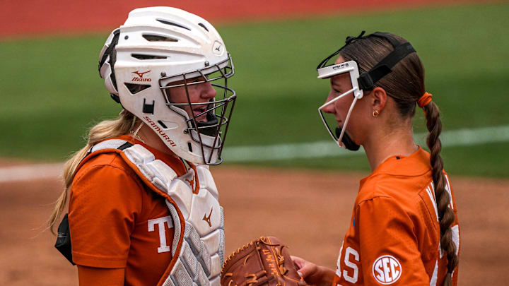 Texas Longhorns catcher Reese Atwood (14) talks to pitcher Teagan Kavan (17) during the NCAA D1 Softball Tournament Regional against UCF at Red and Charline McCombs Field on Sunday, May 18, 2025 in Austin, Texas. Texas Longhorns catcher Reese Atwood (14) talks to pitcher Teagan Kavan (17) during the NCAA D1 Softball Tournament Regional against UCF at Red and Charline McCombs Field on Sunday, May 18, 2025 in Austin, Texas.
