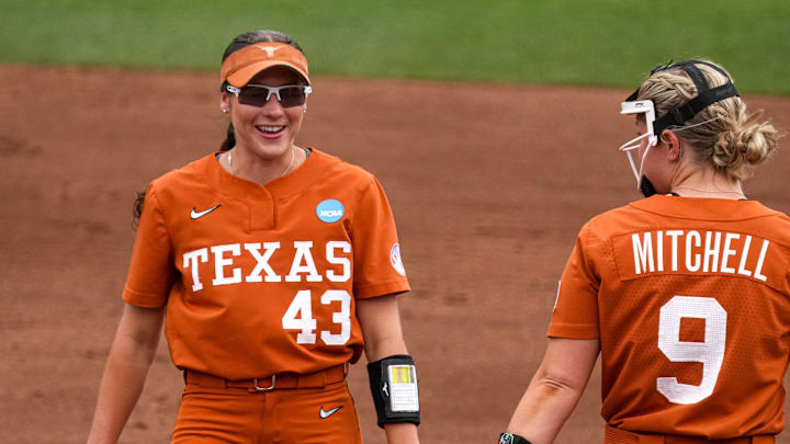 Texas Longhorns infielders Leighann Goode (43) and Joley Mitchell (9) talk on the field during the NCAA D1 Softball Tournament Regional against UCF at Red and Charline McCombs Field on Sunday, May 18, 2025 in Austin, Texas. Texas Longhorns infielders Leighann Goode (43) and Joley Mitchell (9) talk on the field during the NCAA D1 Softball Tournament Regional against UCF at Red and Charline McCombs Field on Sunday, May 18, 2025 in Austin, Texas.