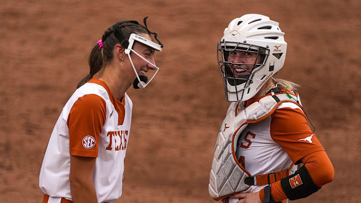 Texas Longhorns pitcher Teagan Kavan (17) talks to catcher Reese Atwood (14) during the game against Kentucky at Red & Charline McCombs Field on Thursday, May 1, 2025 in Austin.