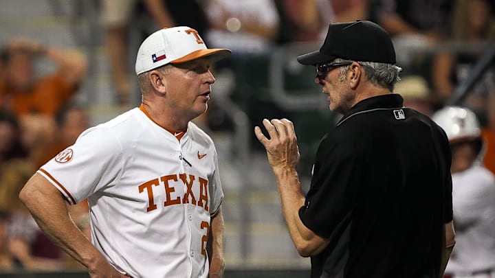 Texas Longhorns head coach Jim Schlossnagle talks to an official during the Lone Star Showdown against Texas A&M at UFCU Disch-Falk Field on Friday, April 25, 2025. Texas Longhorns head coach Jim Schlossnagle talks to an official during the Lone Star Showdown against Texas A&M at UFCU Disch-Falk Field on Friday, April 25, 2025.