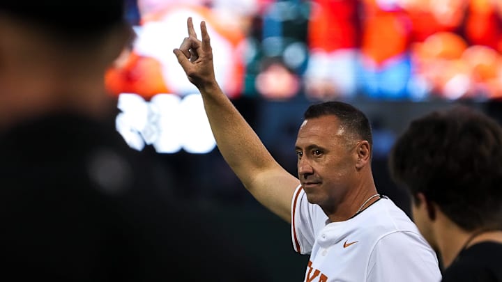 Texas Longhorns head football coach Steve Sarkisian takes the field for the first pitch ahead of the Lone Star Showdown against Texas A&M at UFCU Disch-Falk Field on Friday, April 25, 2025.