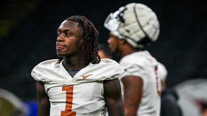 Texas Longhorns wide receiver Xavier Worthy (1) walks the field during practice at the Superdome on