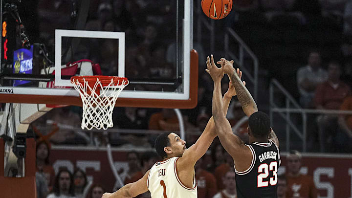 Mar 2, 2024; Austin, Texas, USA; Oklahoma State center Brandon Garrison (23) shoots over Texas