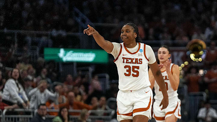 Texas forward Madison Booker celebrates a score during the game against Alabama. Texas forward Madison Booker celebrates a score during the game against Alabama.