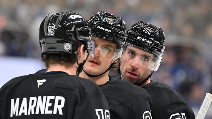 Dec 23, 2024; Toronto, Ontario, CAN; Toronto Maple Leafs forwards Mitch Marner (16) and William Nylander (88) and John Tavares (91) talk before a faceoff against the Winnipeg Jets in the third period at Scotiabank Arena. Mandatory Credit: Dan Hamilton-Imagn Images