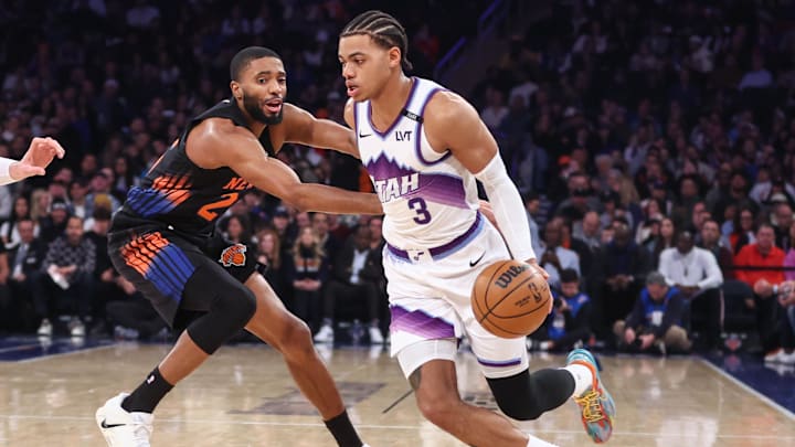 Dec 5, 2025; New York, New York, USA;  Utah Jazz guard Keyonte George (3) looks to drive past New York Knicks guard Mikal Bridges (25) in the first quarter at Madison Square Garden. Mandatory Credit: Wendell Cruz-Imagn Images