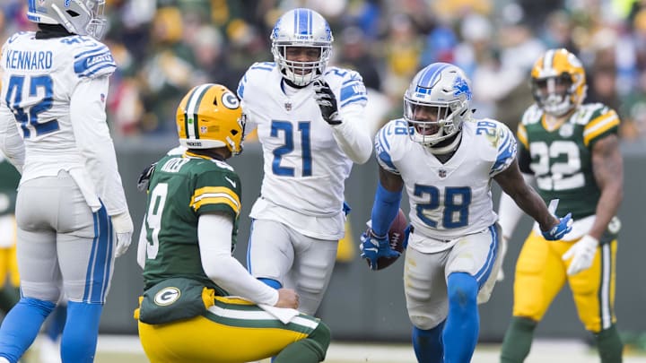 Dec 30, 2018; Green Bay, WI, USA; Detroit Lions cornerback Quandre Diggs (28) celebrates after intercepting a pass from Green Bay Packers quarterback DeShone Kizer (9) during the fourth quarter at Lambeau Field. Mandatory Credit: Jeff Hanisch-Imagn Images