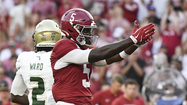 Sep 7, 2024; Tuscaloosa, Alabama, USA;  Alabama Crimson Tide wide receiver Germie Bernard (5) celebrates after a first down reception against the South Florida Bulls at Bryant-Denny Stadium. Mandatory Credit: Gary Cosby Jr.-Imagn Images