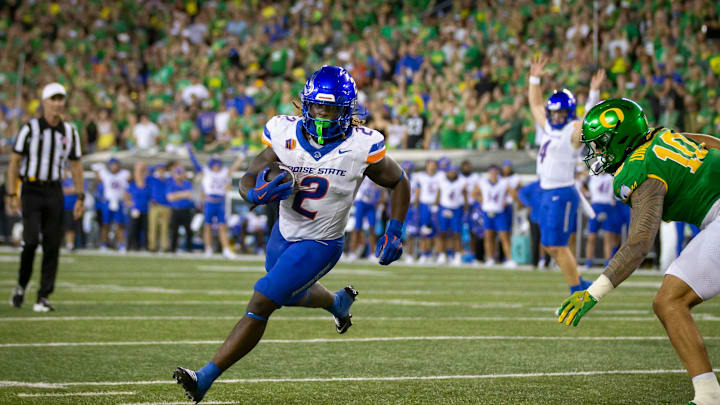 Boise State running back Ashton Jeanty carries the ball for a touchdown as the Oregon Ducks host the Boise State Broncos. Boise State running back Ashton Jeanty carries the ball for a touchdown as the Oregon Ducks host the Boise State Broncos.