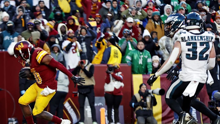 Dec 22, 2024; Landover, Maryland, USA; Washington Commanders wide receiver Jamison Crowder (80) catches the game winning touchdown during the fourth quarter against the Philadelphia Eagles at Northwest Stadium. Dec 22, 2024; Landover, Maryland, USA; Washington Commanders wide receiver Jamison Crowder (80) catches the game winning touchdown during the fourth quarter against the Philadelphia Eagles at Northwest Stadium.