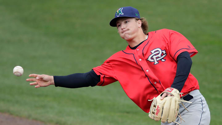 Cedar Rapids Kernels' Luke Keaschall (44) throws to first base against the Wisconsin Timber Rattlers during their baseball game Wednesday, April 17, 2024, at Neuroscience Group Field at Fox Cities Stadium in Grand Chute, Wisconsin.