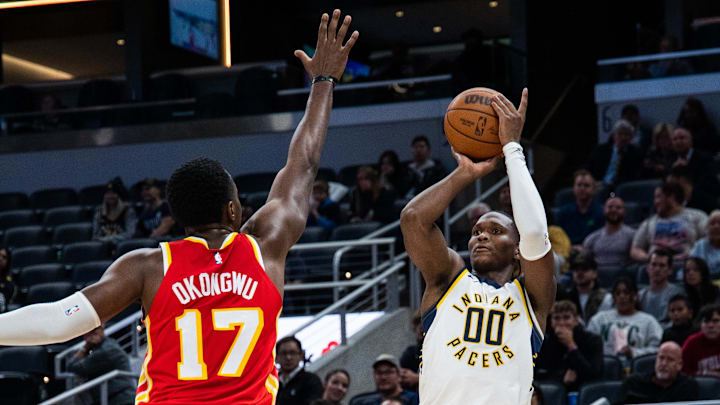 Oct 16, 2023; Indianapolis, Indiana, USA; Indiana Pacers guard Bennedict Mathurin (00) shoots the ball while Atlanta Hawks forward Onyeka Okongwu (17) defends in the second half at Gainbridge Fieldhouse. Mandatory Credit: Trevor Ruszkowski-Imagn Images Oct 16, 2023; Indianapolis, Indiana, USA; Indiana Pacers guard Bennedict Mathurin (00) shoots the ball while Atlanta Hawks forward Onyeka Okongwu (17) defends in the second half at Gainbridge Fieldhouse. Mandatory Credit: Trevor Ruszkowski-Imagn Images