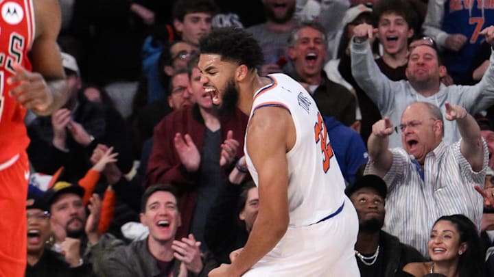 Nov 13, 2024; New York, New York, USA; New York Knicks center Karl-Anthony Towns (32) reacts after a dunk against the Chicago Bulls during the second half at Madison Square Garden. Mandatory Credit: John Jones-Imagn Images