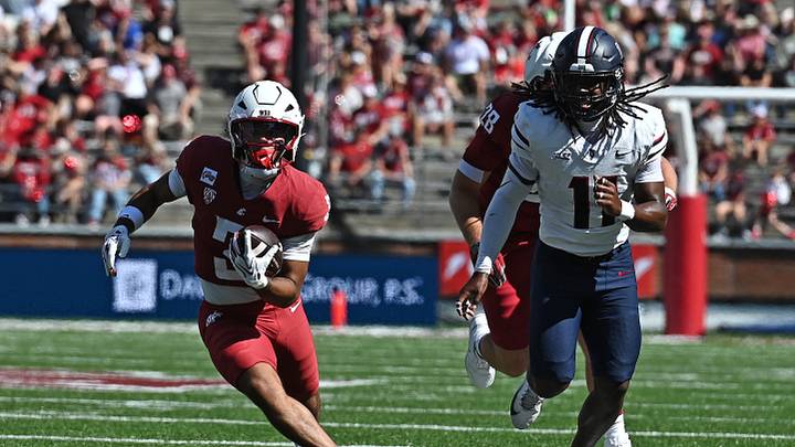 Sep 19, 2026; Pullman, Washington, USA; Washington State Cougars running back Maxwell Woods (3) gets past Duquesne Dukes linebacker Zach Chambers (11) during the first half at Gesa Field at Martin Stadium.  