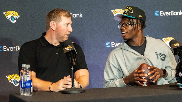 Jacksonville Jaguars Head Coach Liam Coen, left, talks with the team’s first-round pick, Colorado Buffaloes wide receiver and defensive back Travis Hunter, right, Friday, March 25, 2025 at Miller Electric Center in Jacksonville, Fla. during a press conference. [Doug Engle/Florida Times-Union]