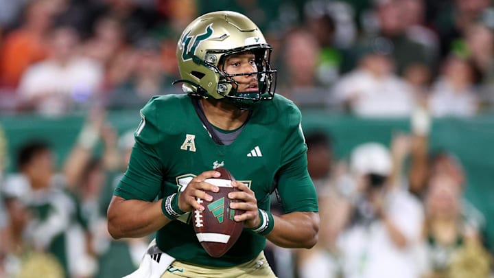 Sep 21, 2024; Tampa, Florida, USA; South Florida Bulls quarterback Byrum Brown (17) drops back to pass against the Miami Hurricanes in the first half  at Raymond James Stadium. Mandatory Credit: Nathan Ray Seebeck-Imagn Images