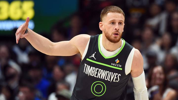 Apr 18, 2026; Denver, Colorado, USA; Minnesota Timberwolves guard Donte DiVincenzo (0) celebrates after a three-pointer during the second half against the Denver Nuggets in game one of the first round of the 2026 NBA Playoffs at Ball Arena. Mandatory Credit: Christopher Hanewinckel-Imagn Images