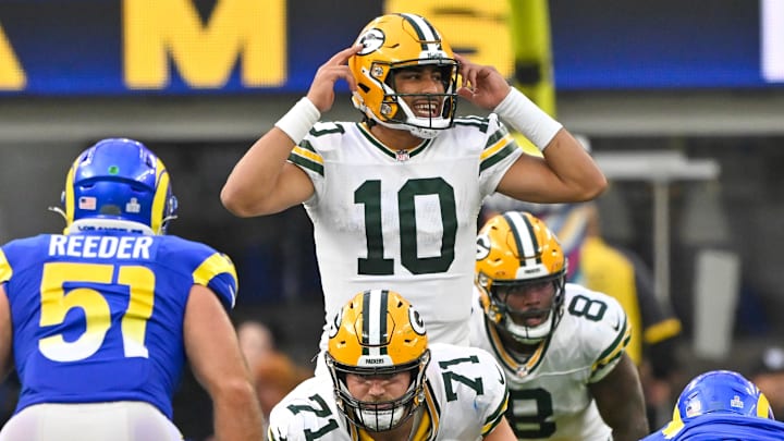 Oct 6, 2024; Inglewood, California, USA;  Green Bay Packers quarterback Jordan Love (10) calls a play during the fourth quarter against the Los Angeles Rams at SoFi Stadium. Mandatory Credit: Robert Hanashiro-Imagn Images