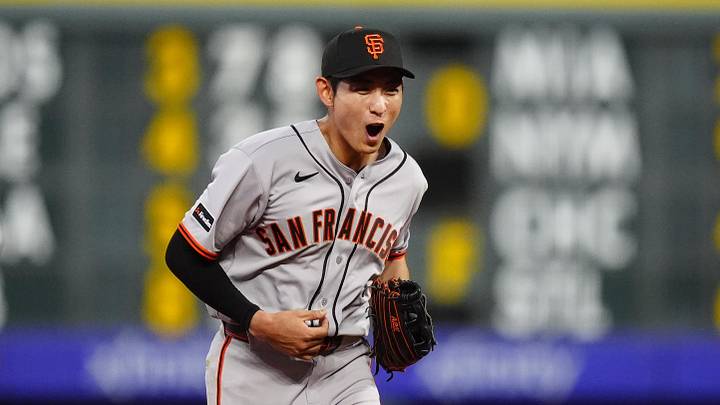 May 29, 2026; Denver, Colorado, USA; San Francisco Giants right fielder Jung Hoo Lee (51) celebrates his fielding play in the fifth inning against the Colorado Rockies at Coors Field. Mandatory Credit: Ron Chenoy-Imagn Images