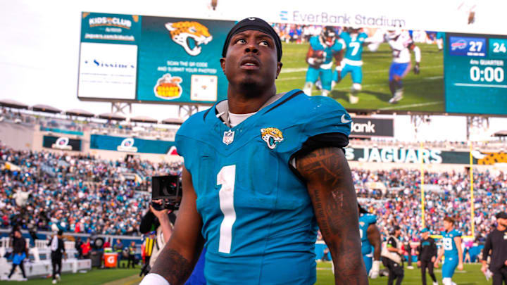 Jacksonville Jaguars running back Travis Etienne Jr. (1) walks off the field after losing to the Bills during an NFL football AFC Wild Card playoff matchup, Sunday, Jan. 11, 2026, in Jacksonville, Fla. Bills lead 10-7 at the half over the Jaguars. The Bills defeated the Jaguars 27-24. [Doug Engle/Florida Times-Union]