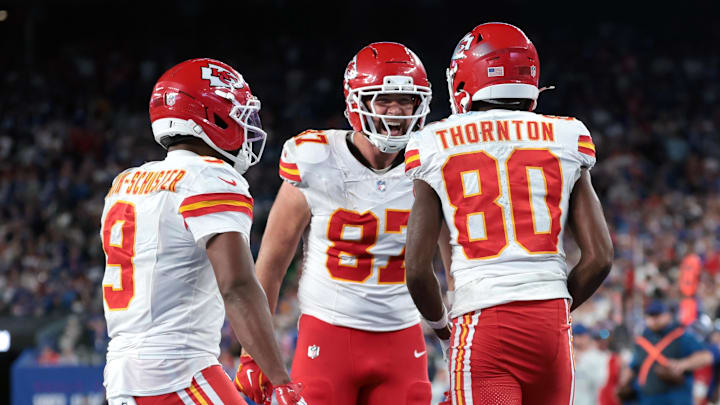 Sep 21, 2025; East Rutherford, New Jersey, USA; Kansas City Chiefs wide receiver Tyquan Thornton (80) celebrates with tight end Travis Kelce (87) and wide receiver Juju Smith-Schuster (9) after a reception against the New York Giants in the fourth quarter at MetLife Stadium. Mandatory Credit: Vincent Carchietta-Imagn Images