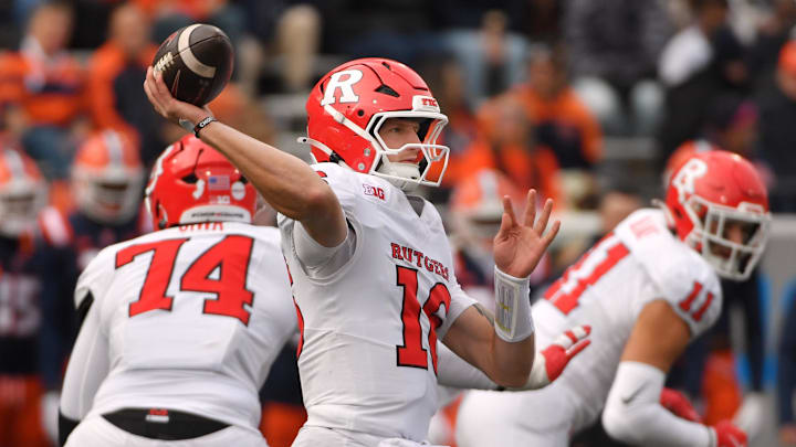 Nov 1, 2025; Champaign, Illinois, USA;  Rutgers Scarlet Knights quarterback Athan Kaliakmanis (16) passes the ball during the second half against the Illinois Fighting Illini  at Memorial Stadium. Mandatory Credit: Ron Johnson-Imagn Images