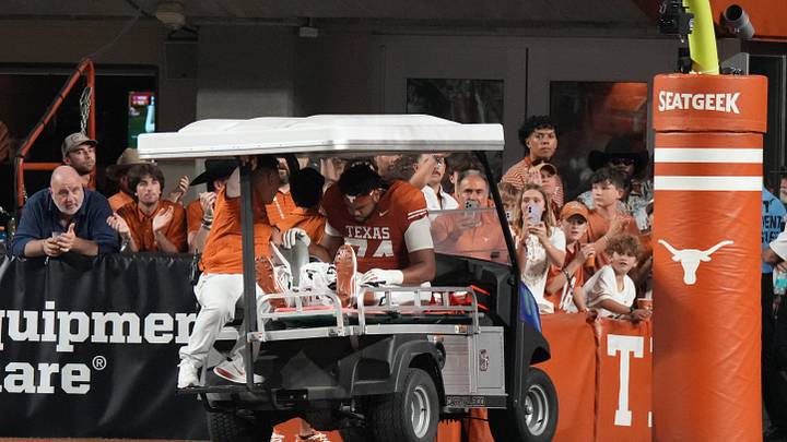 Oct 24, 2026; Austin, Texas, USA; Texas Longhorns offensive line Trevor Goosby (74) is carted off the field after an injury during the first half against the Mississippi Rebels at Darrell K Royal-Texas Memorial Stadium. Mandatory Credit: Scott Wachter-Imagn Images Oct 24, 2026; Austin, Texas, USA; Texas Longhorns offensive line Trevor Goosby (74) is carted off the field after an injury during the first half against the Mississippi Rebels at Darrell K Royal-Texas Memorial Stadium. Mandatory Credit: Scott Wachter-Imagn Images